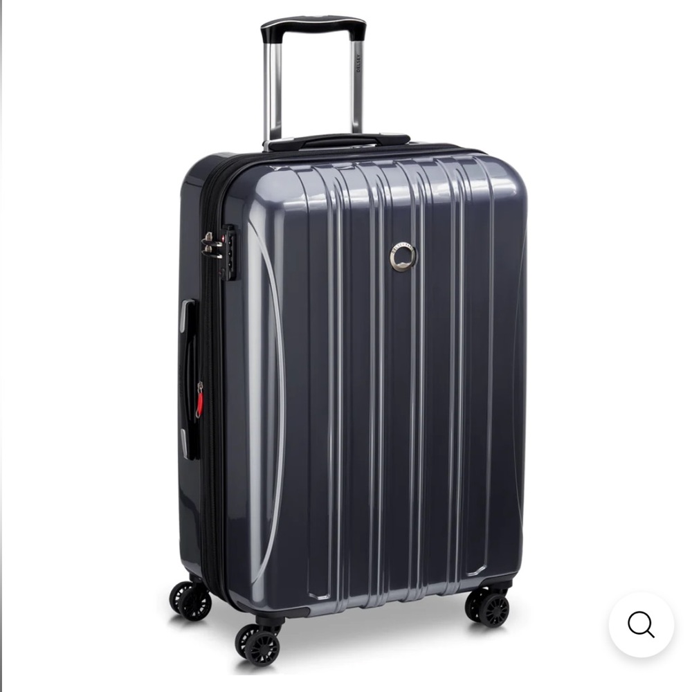 Delsey Paris Helium Aero Hardside Medium 25" Checked In Spinner Luggage